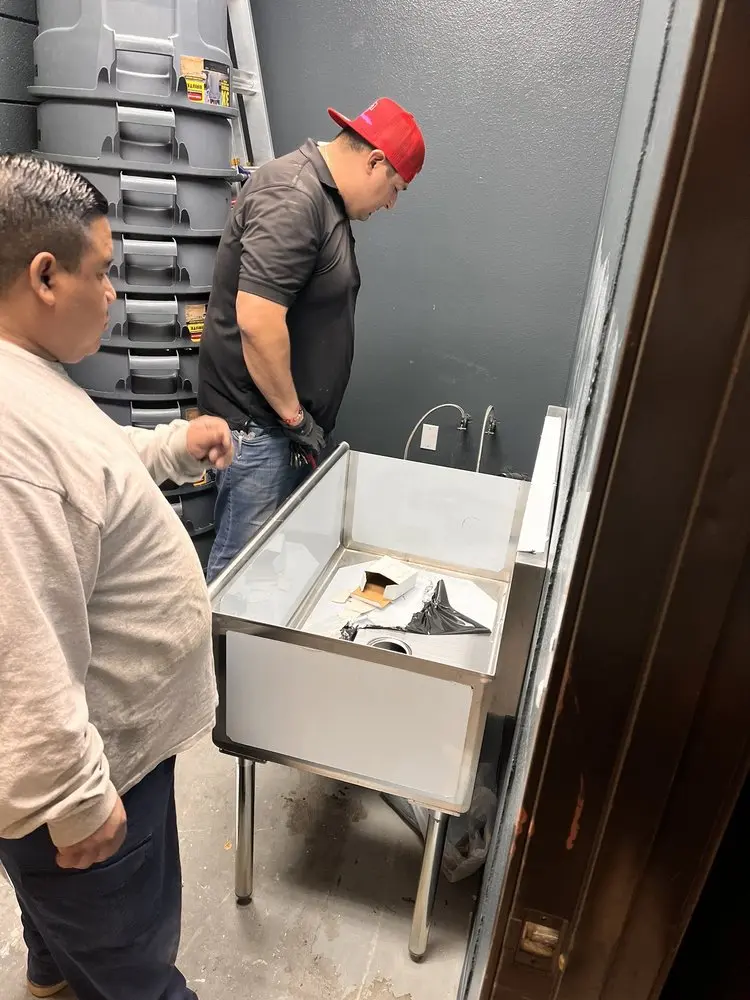 Commercial plumbing and sink installation in Alvin